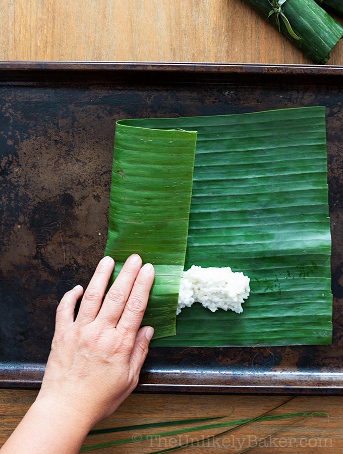 Sticky rice wrapped in banana leaf.