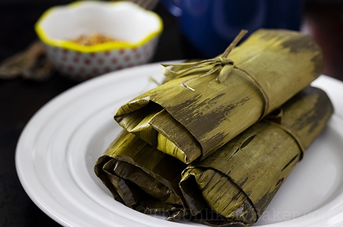 Suman malagkit wrapped in banana leaves.