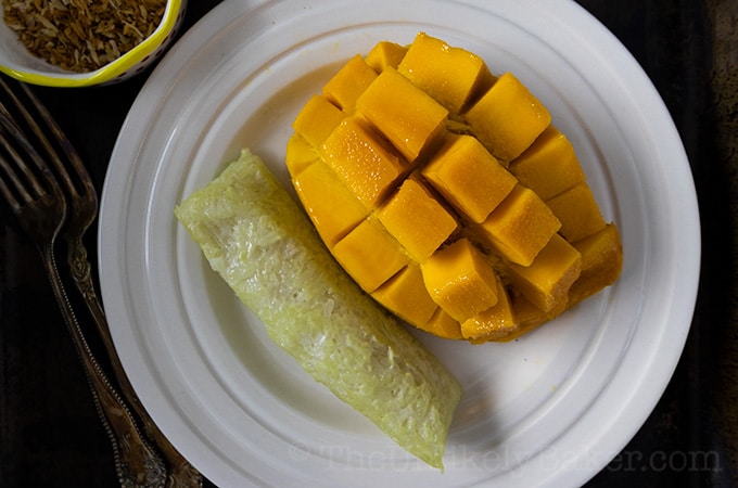 Filipino dessert of suman with fresh mango.