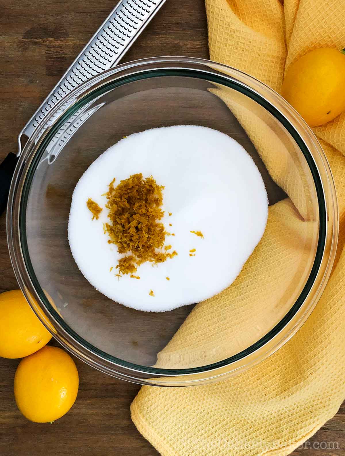 Lemon zest and sugar in a bowl