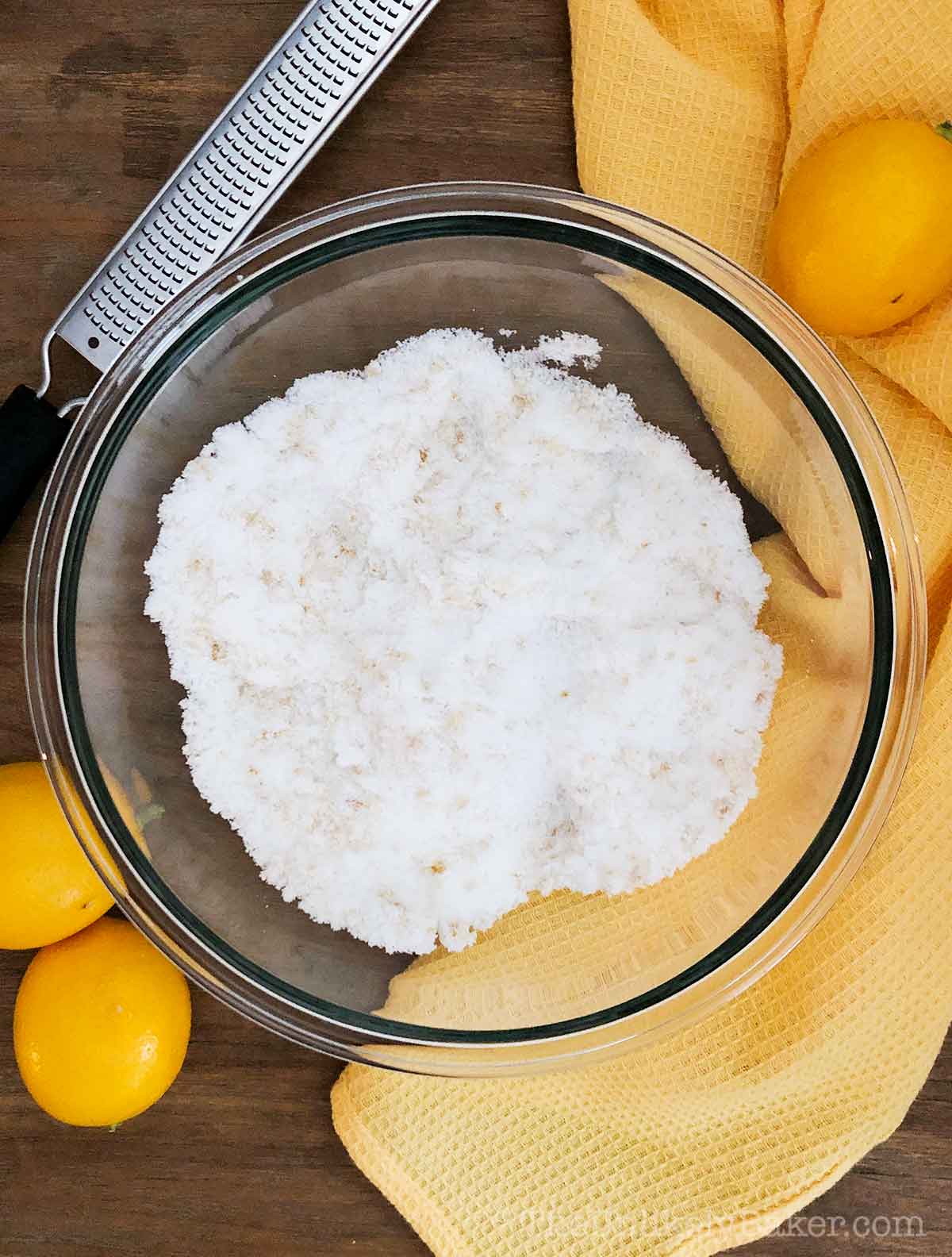 Lemon zest and sugar mixed in a bowl