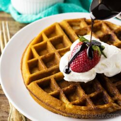 Strawberry Waffles Drizzled with Chocolate Syrup