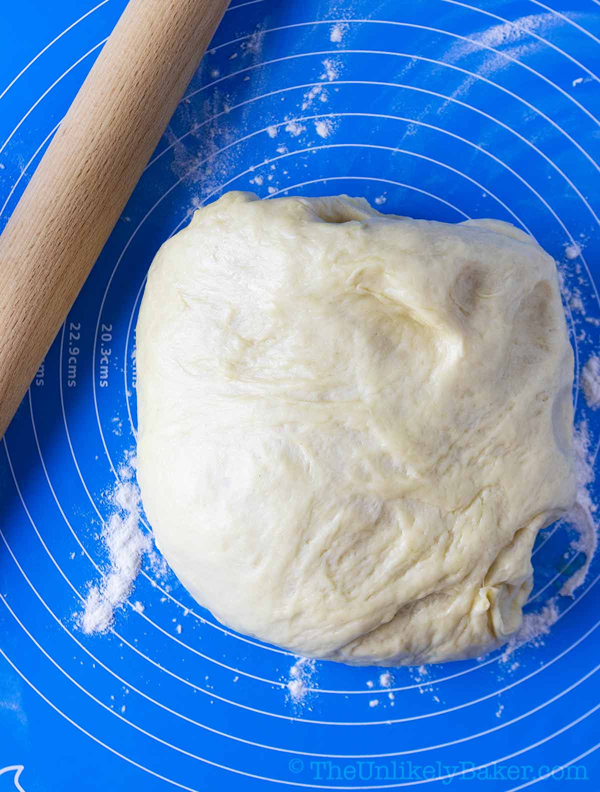 Bread dough on a lightly floured surface.