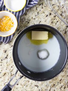 Milk butter and sugar in a saucepan.