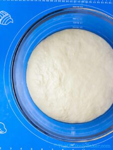 Ube bun dough rising after 2 hours.