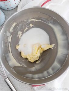 Butter and sugar in a mixing bowl