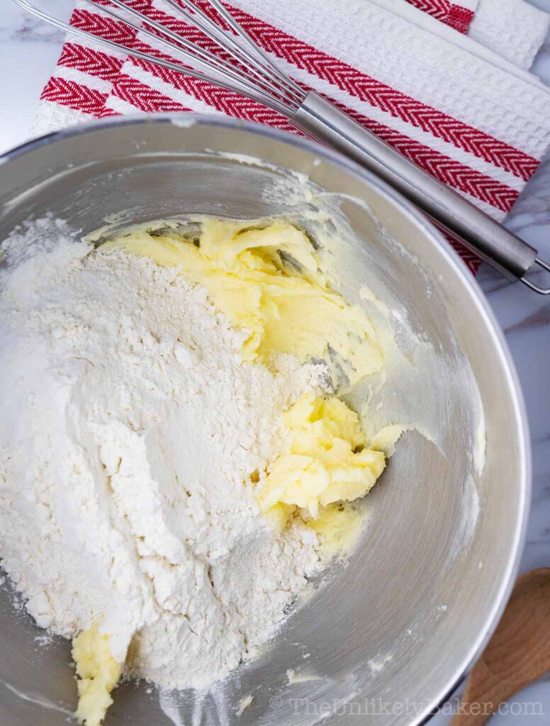 Creamed butter sugar and flour in mixing bowl
