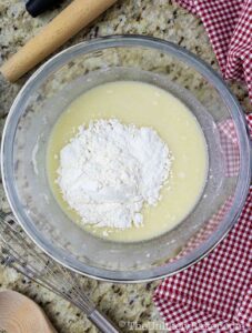 add flour to yeast mixture