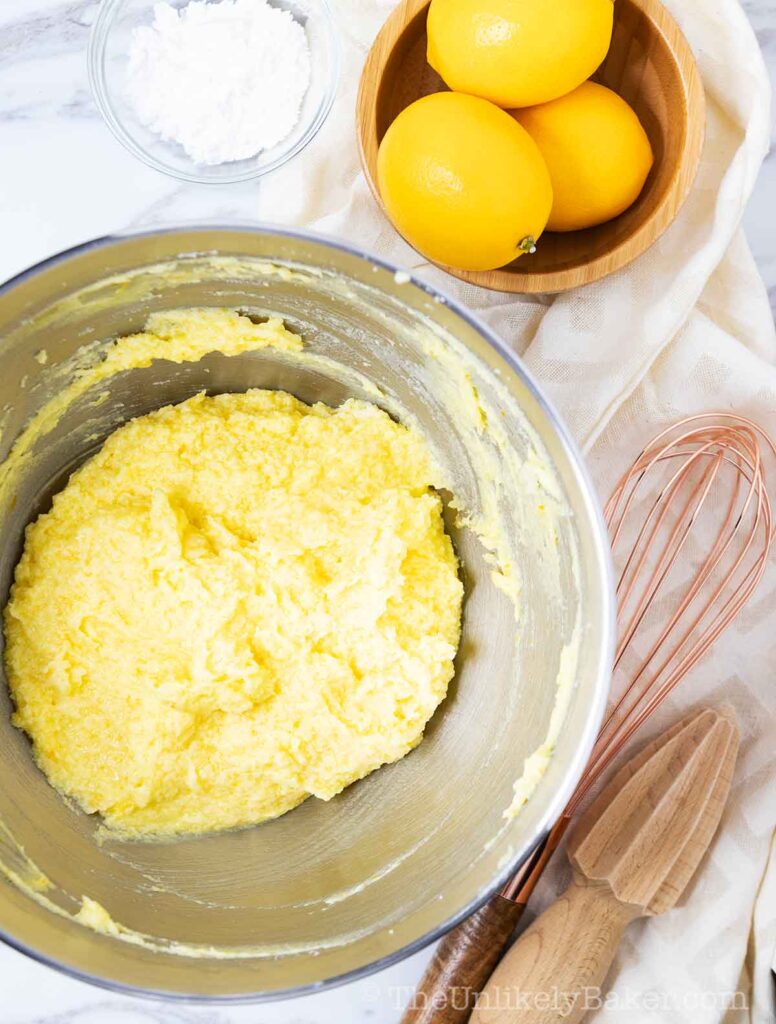creamed butter and lemon sugar in a mixing bowl