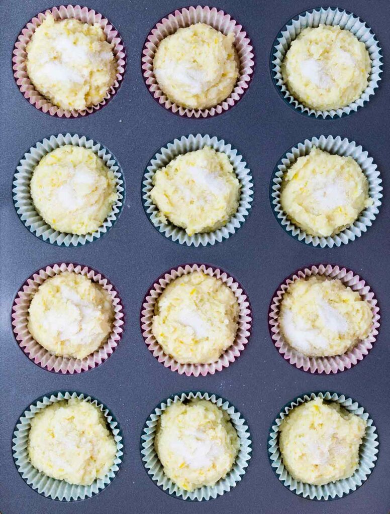 lemon ricotta muffins batter with sugar