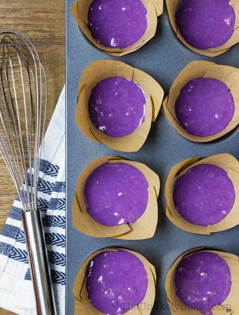 ube muffins batter in muffin cups