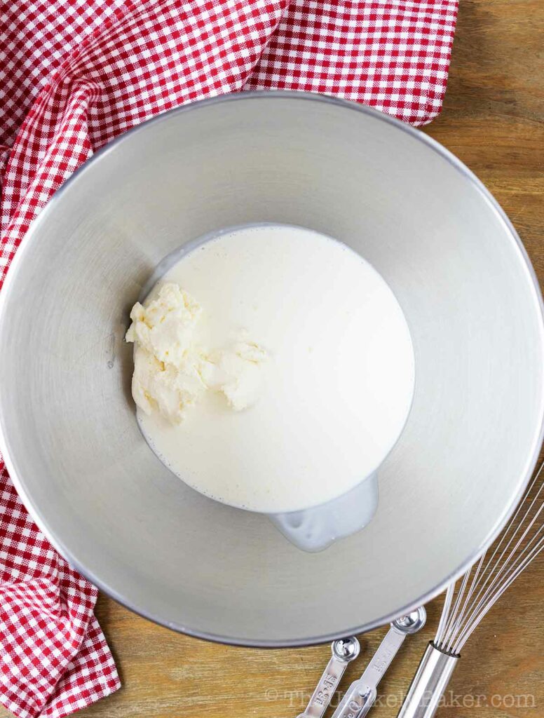 Mascarpone cheese and heavy cream in a bowl