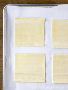 Cut puff pastry into 4