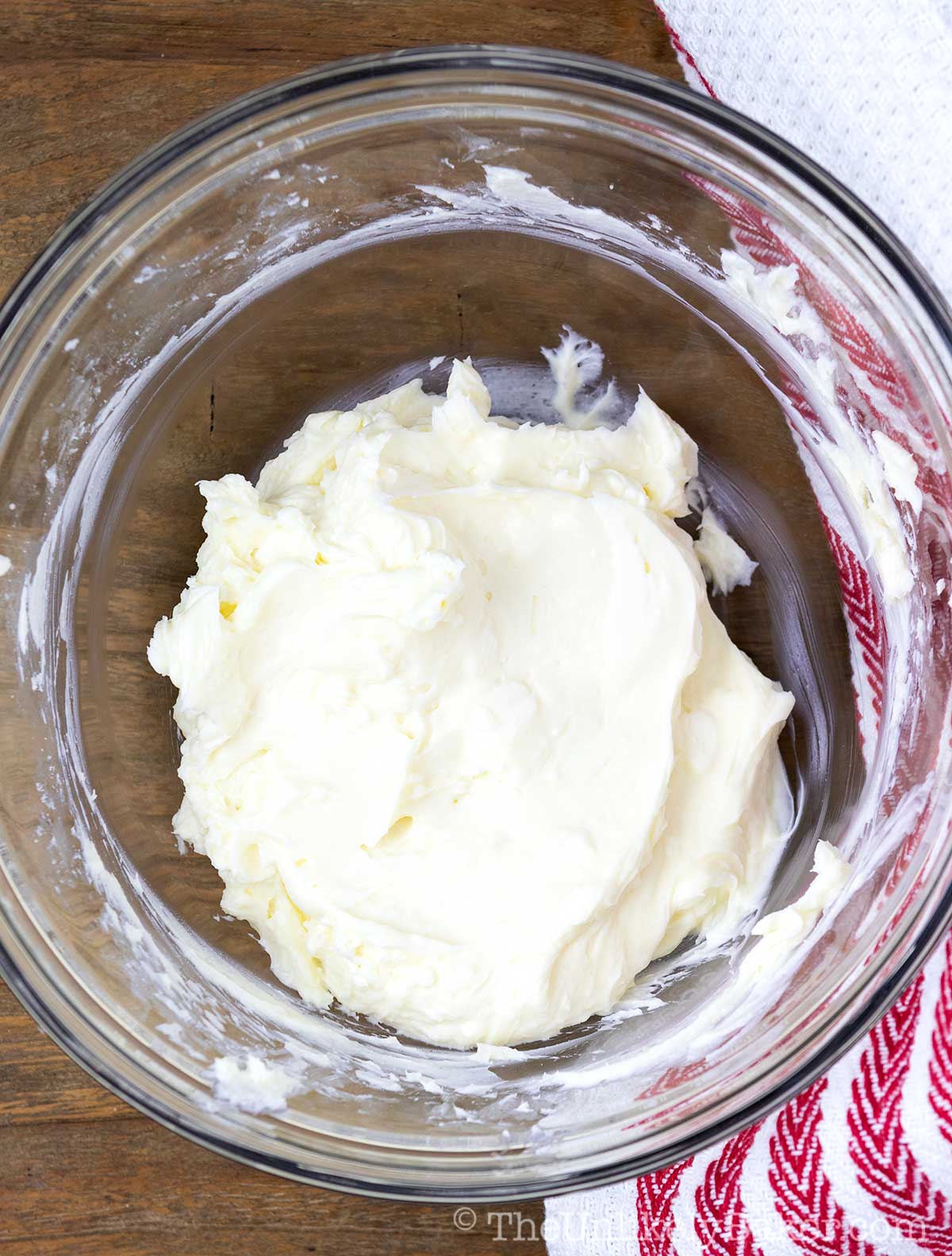 Beat cream cheese and sugar until smooth.