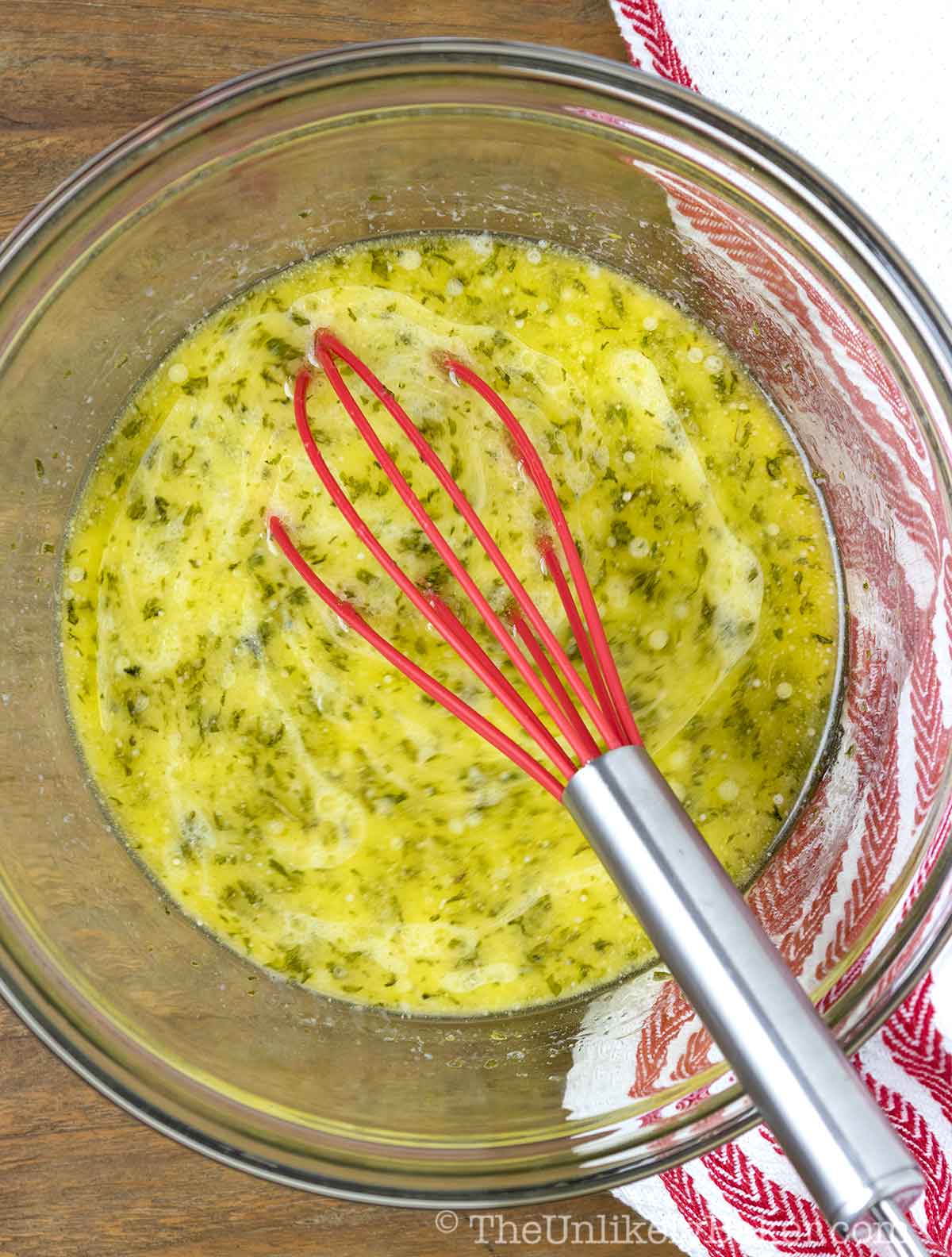 Whisk garlic butter sauce.