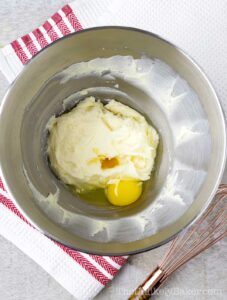 Add egg to mascarpone cheese