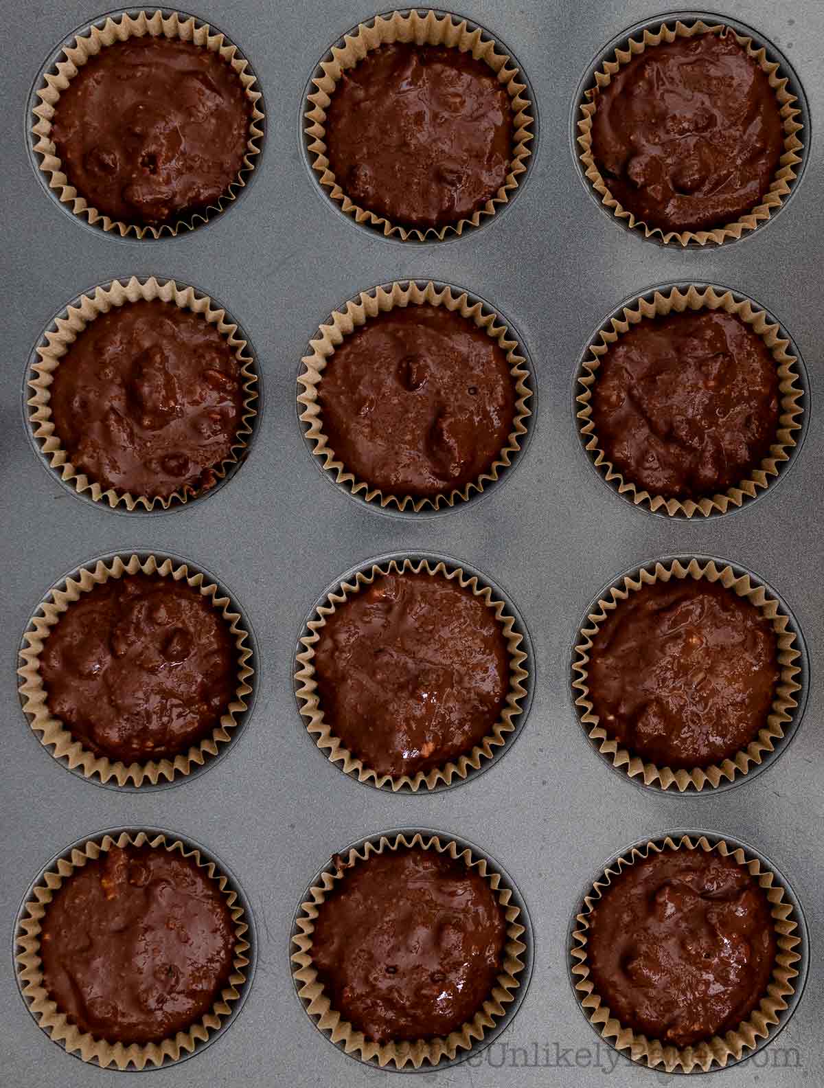Chocolate ricotta muffin batter in pan