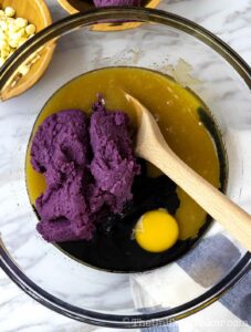Add ube and egg into butter mixture