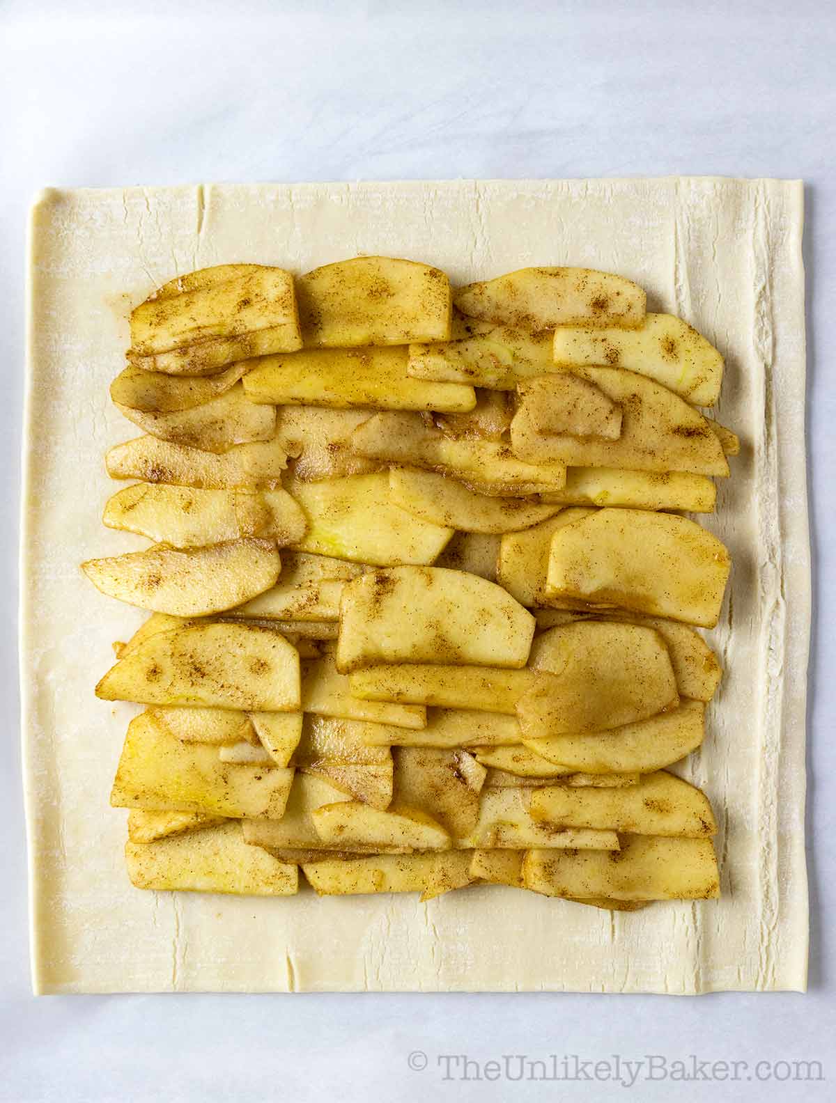 Place apple slices on puff pastry