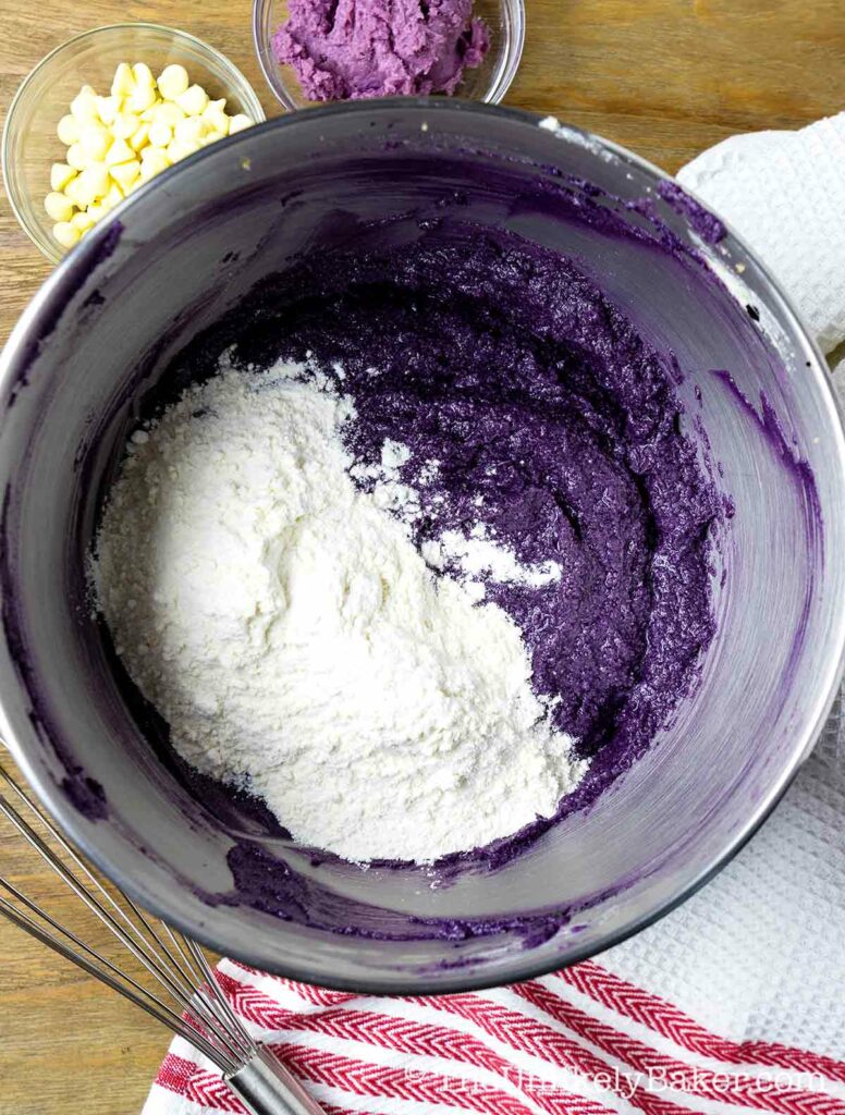 Add flour mixture to ube mixture