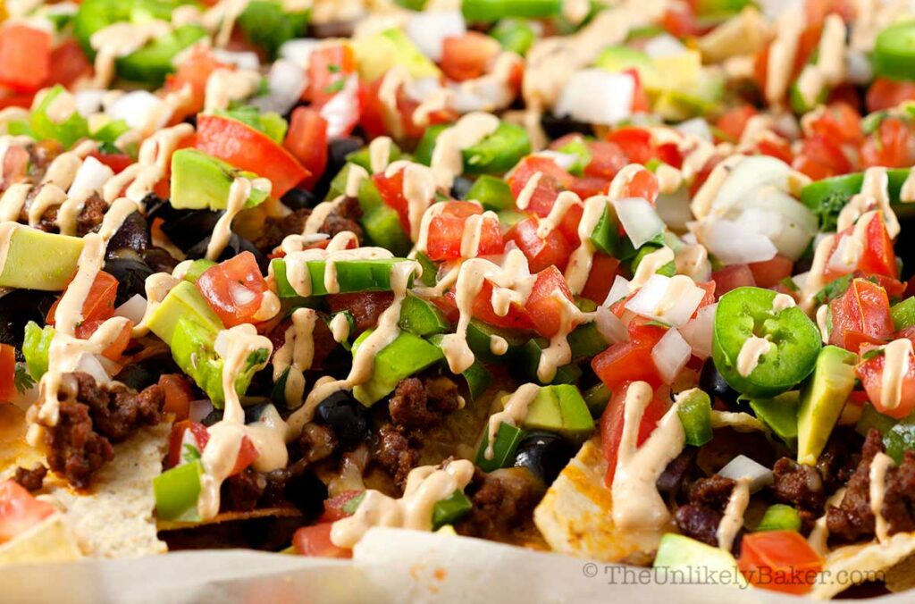 Ultimate nachos drizzled with chipotle cream