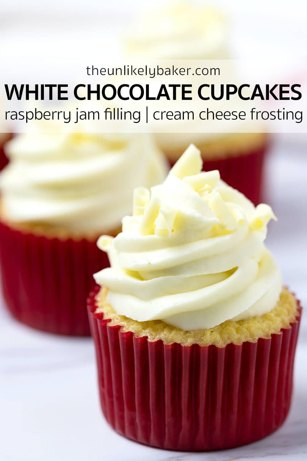 White Chocolate Cupcakes with Raspberry Filling - The Unlikely Baker