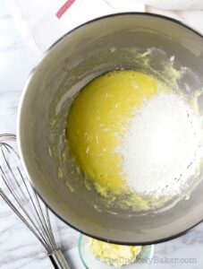 Flour added to egg and white chocolate mixture