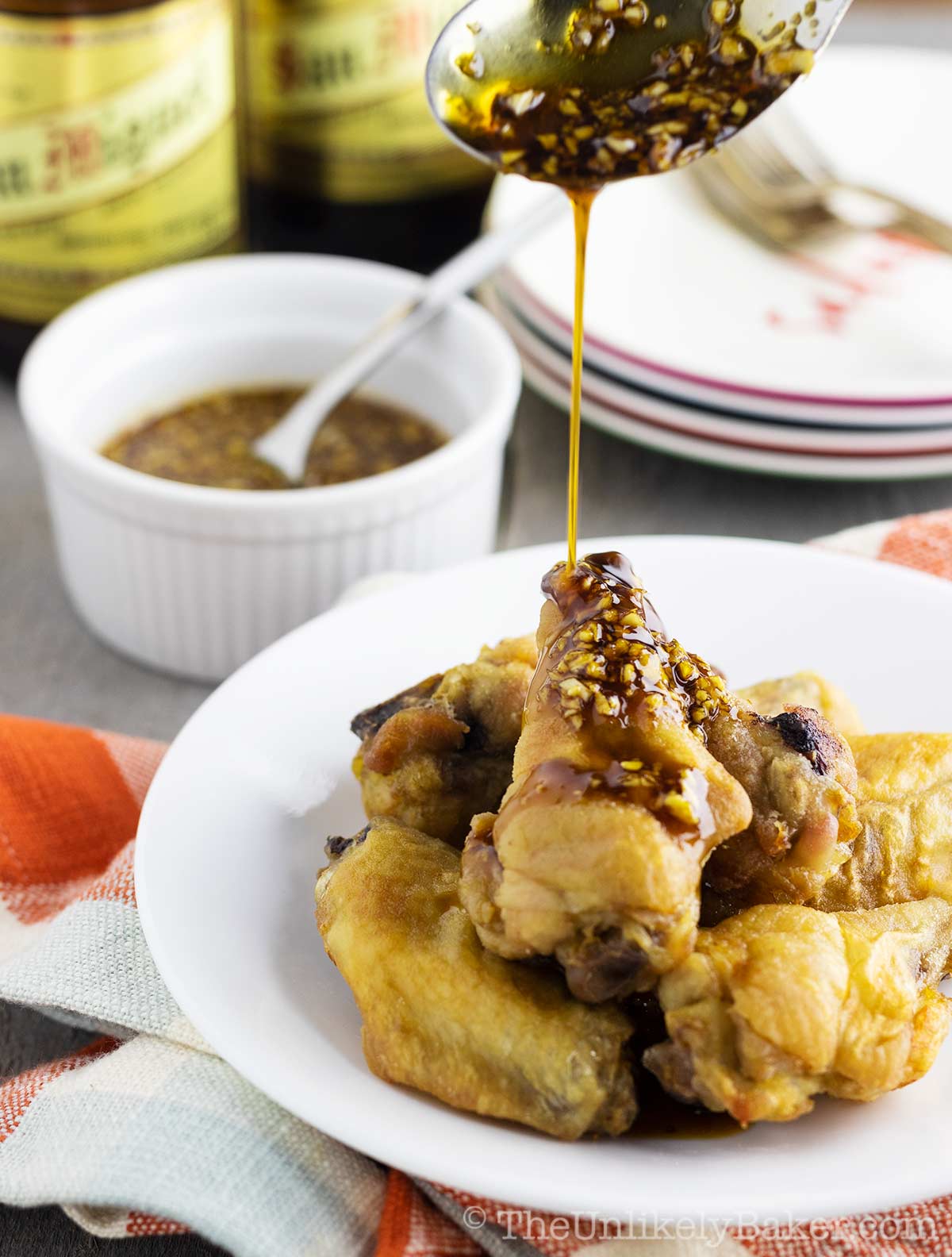 Crispy Baked Chicken Wings Drizzled with Asian Garlic Sauce