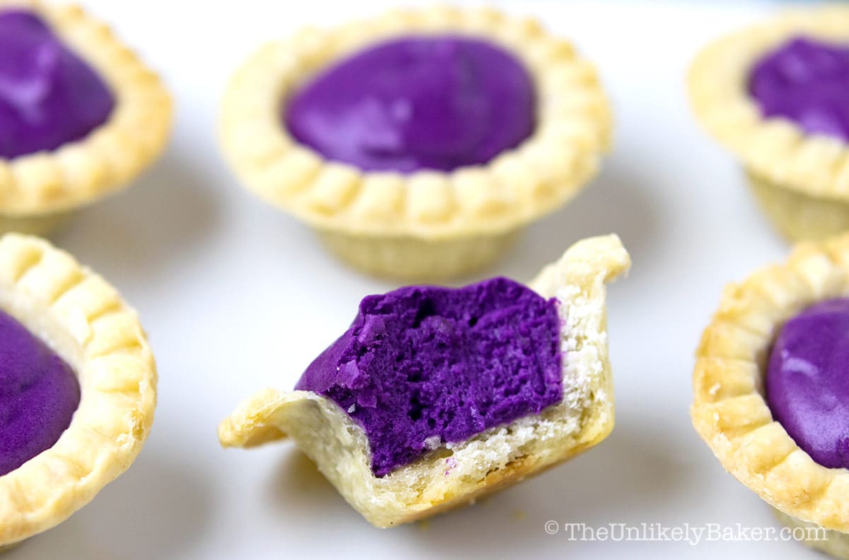Shot of ube tart with a bite.