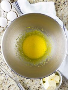 Egg yolks whisked in a bowl.