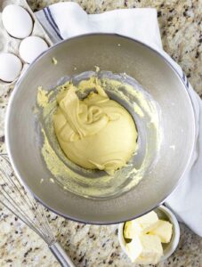 Flour added to egg yolk mixture.