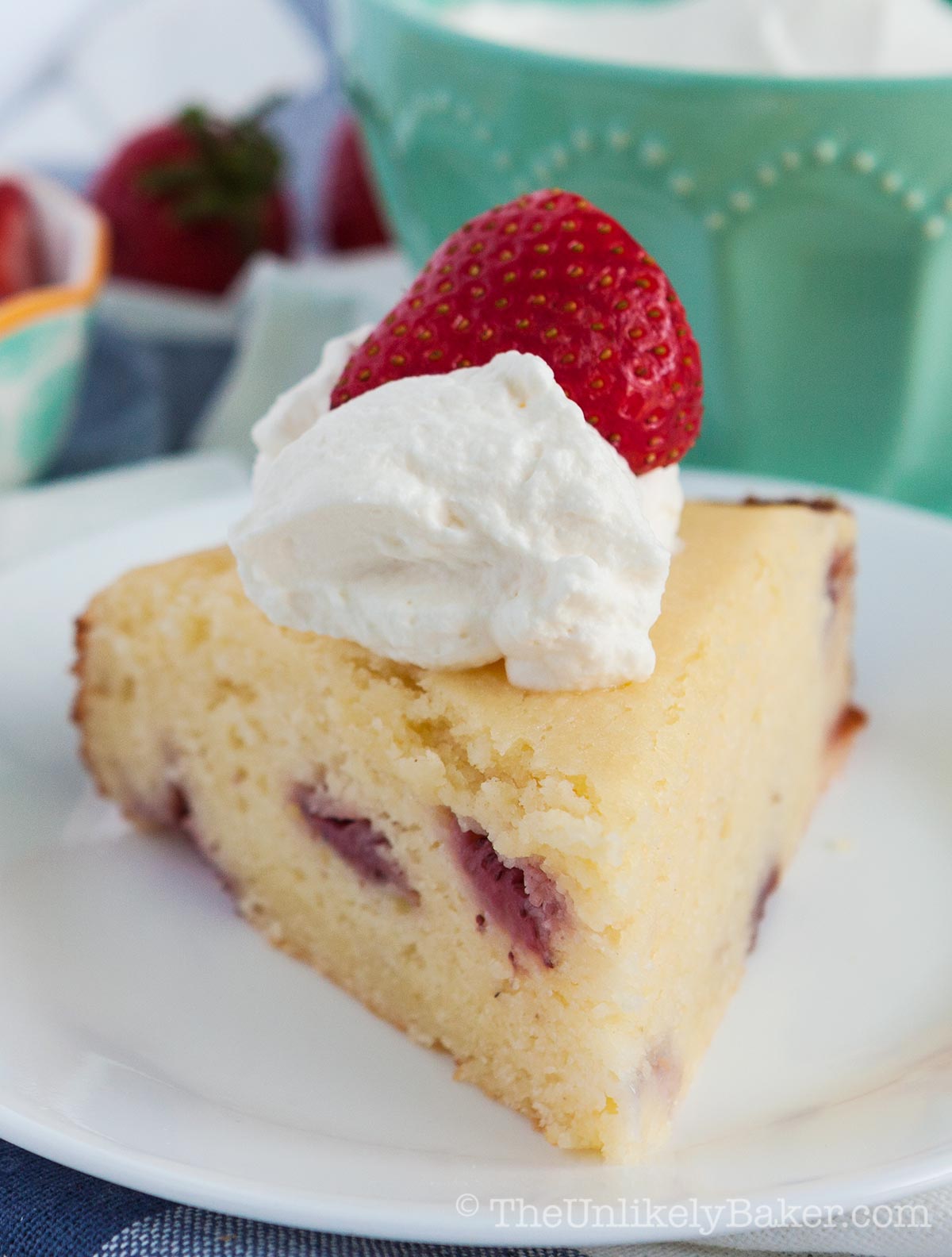 Slice of strawberry cake with ricotta on a plate.