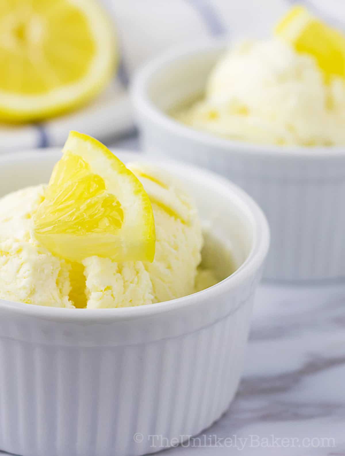 Two bowls with homemade lemon ice cream.