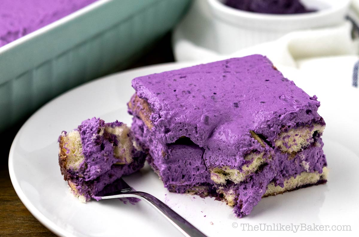 A slice of ube refrigerated cake on a plate.
