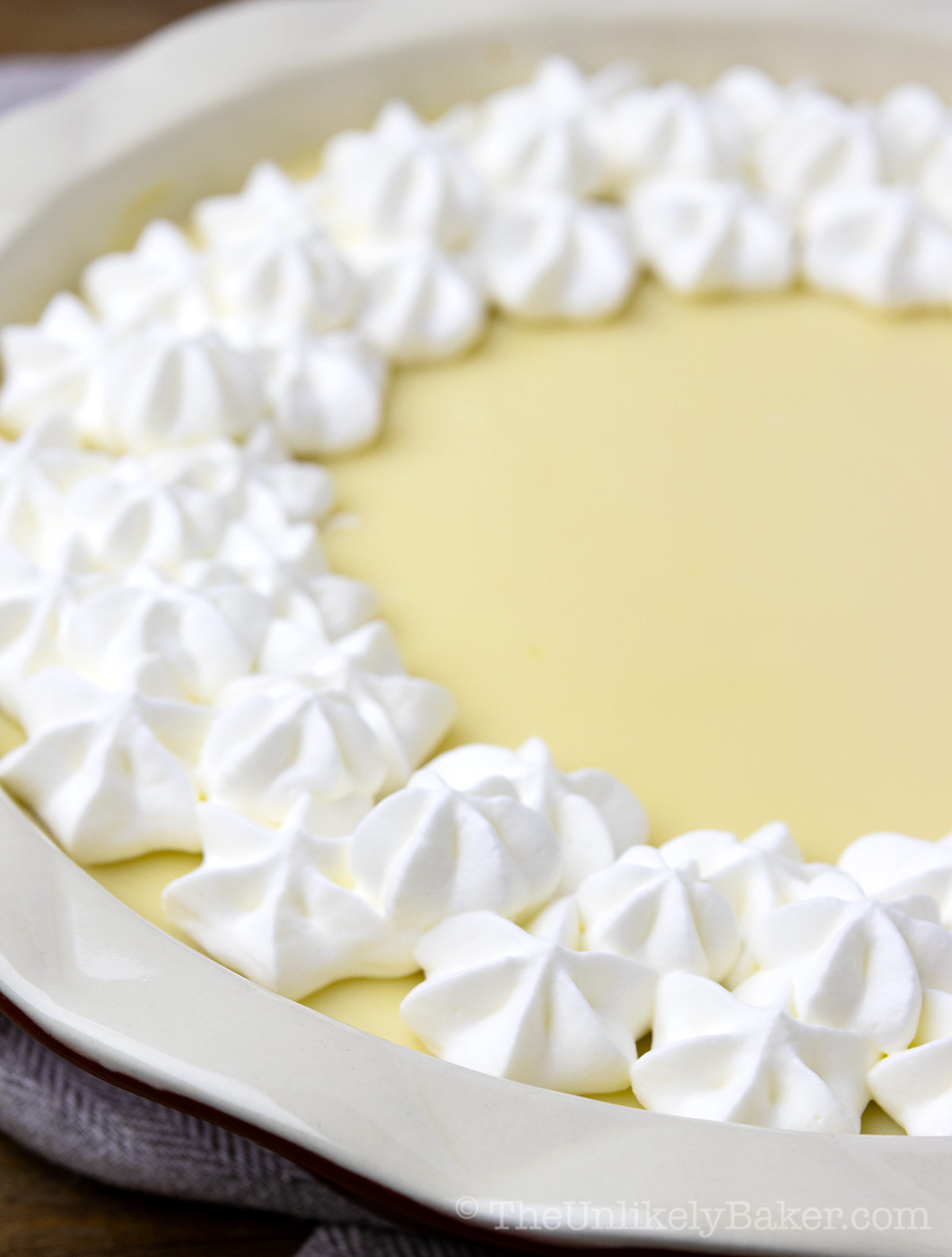 Whipped cream on top of easy calamansi pie.