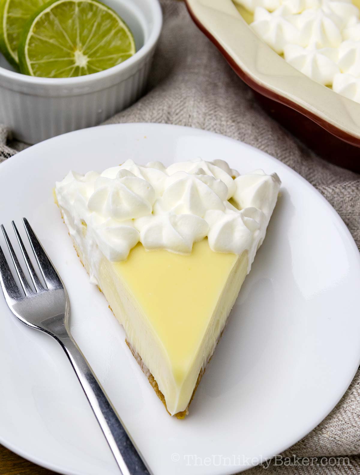 A slice of refreshing calamansi pie on a plate.