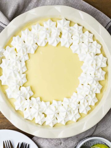 Calamansi pie topped with whipped cream.