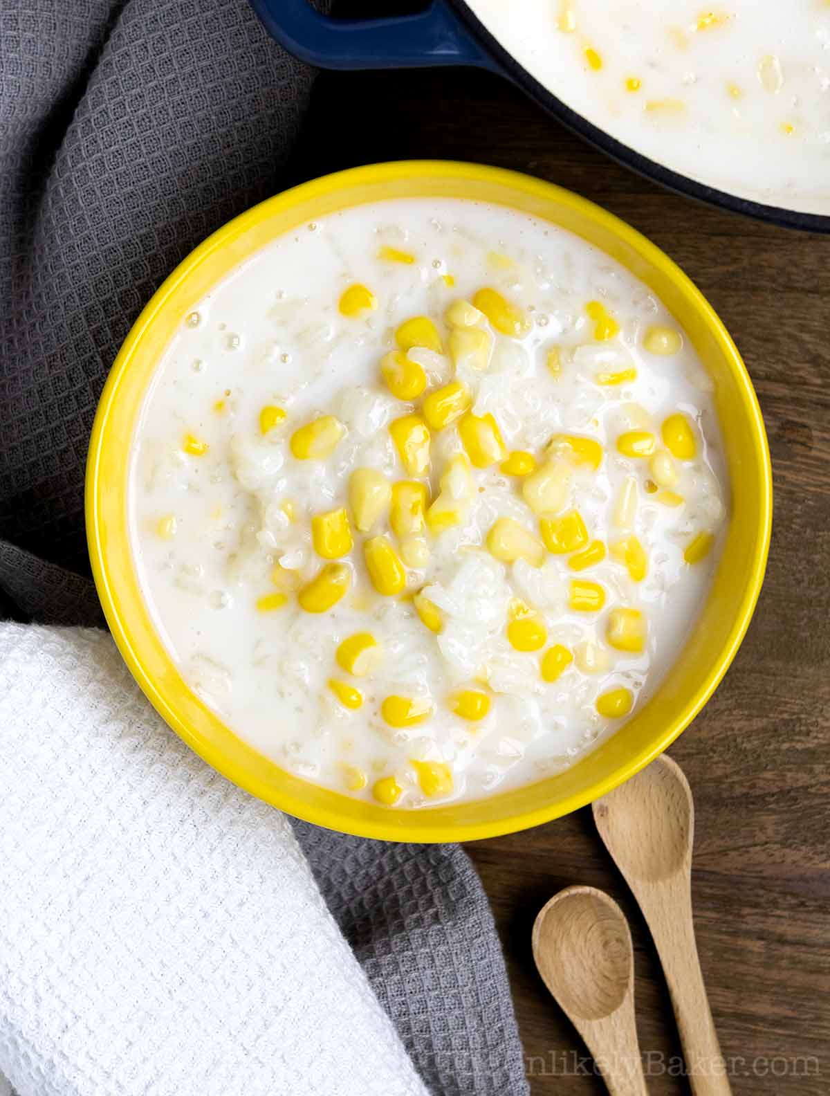 Filipino sweet coconut rice pudding in a yellow bowl.
