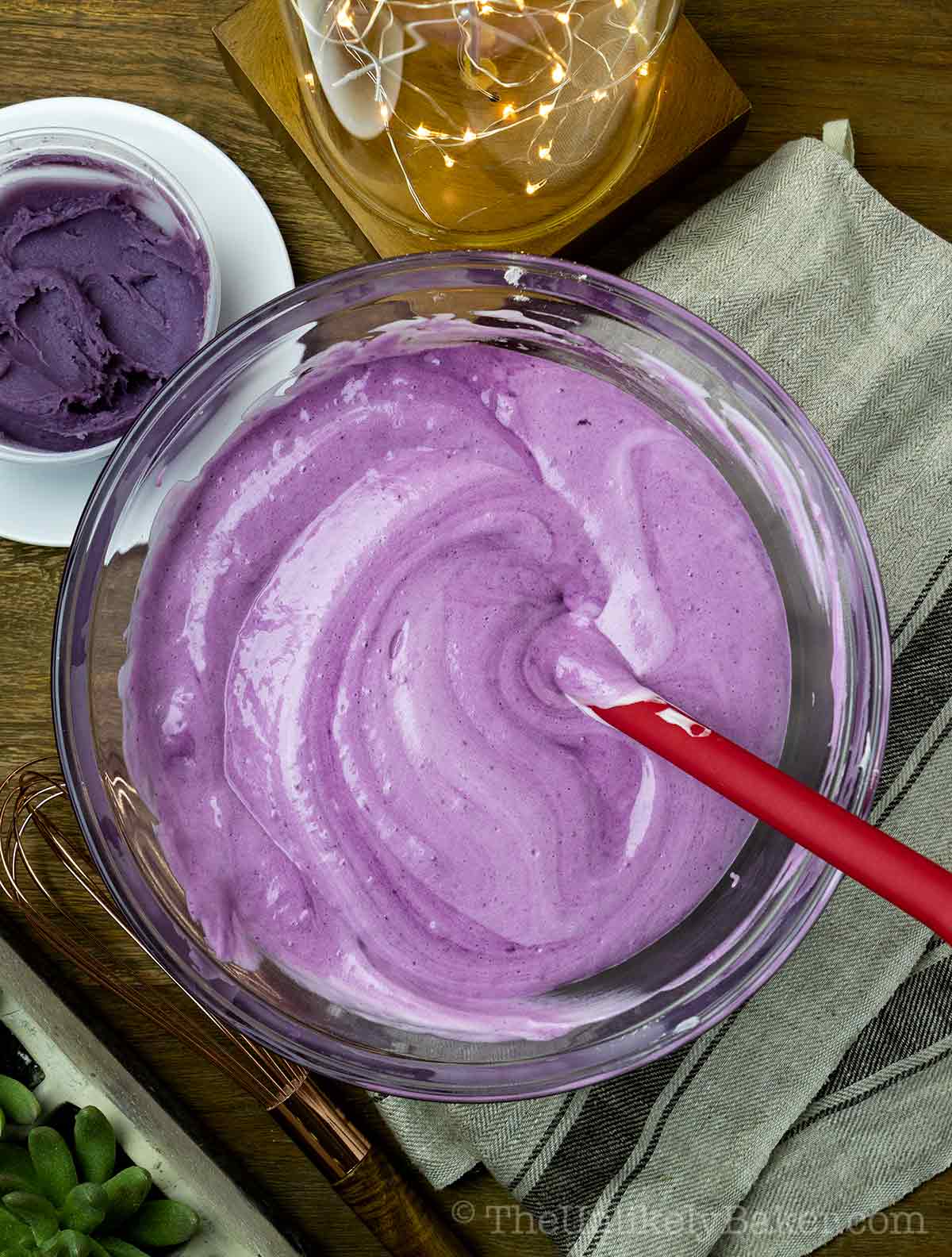 Purple yam cake batter in a bowl.