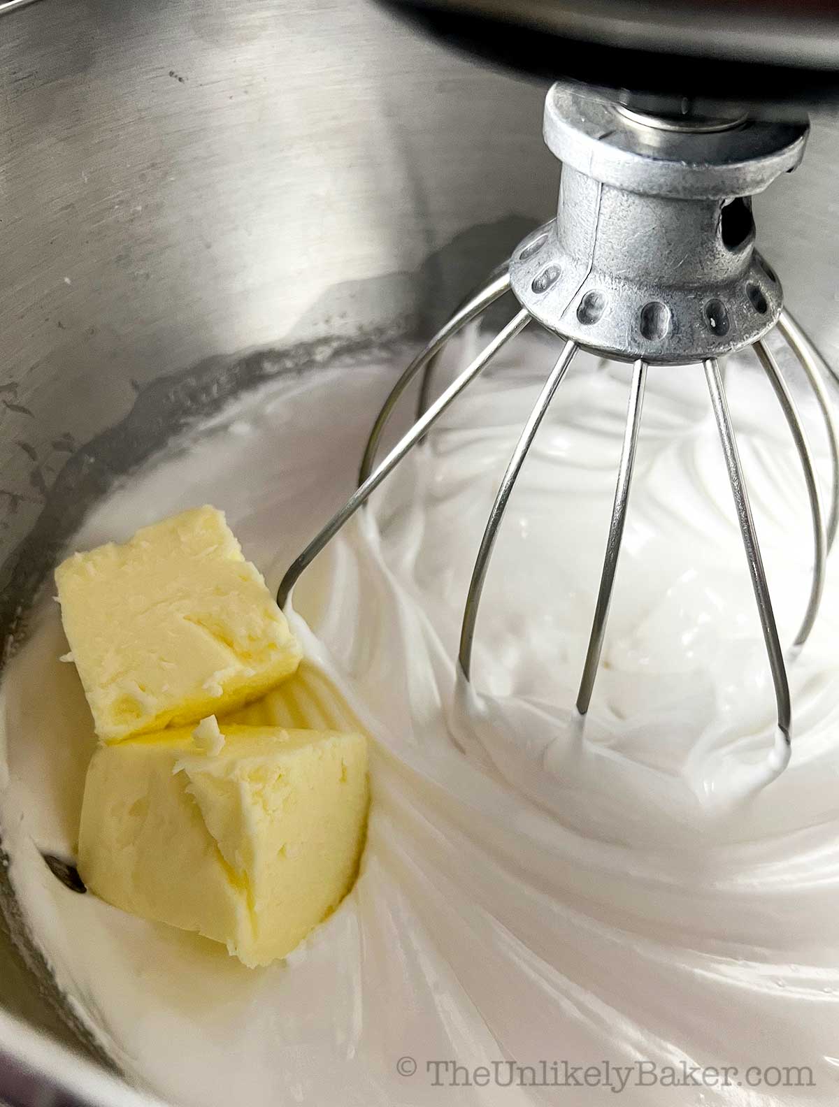 Butter added to stiff egg whites.