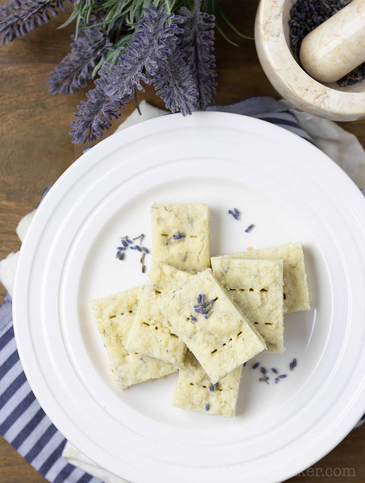 Lavender shortbread cookies on a plate.