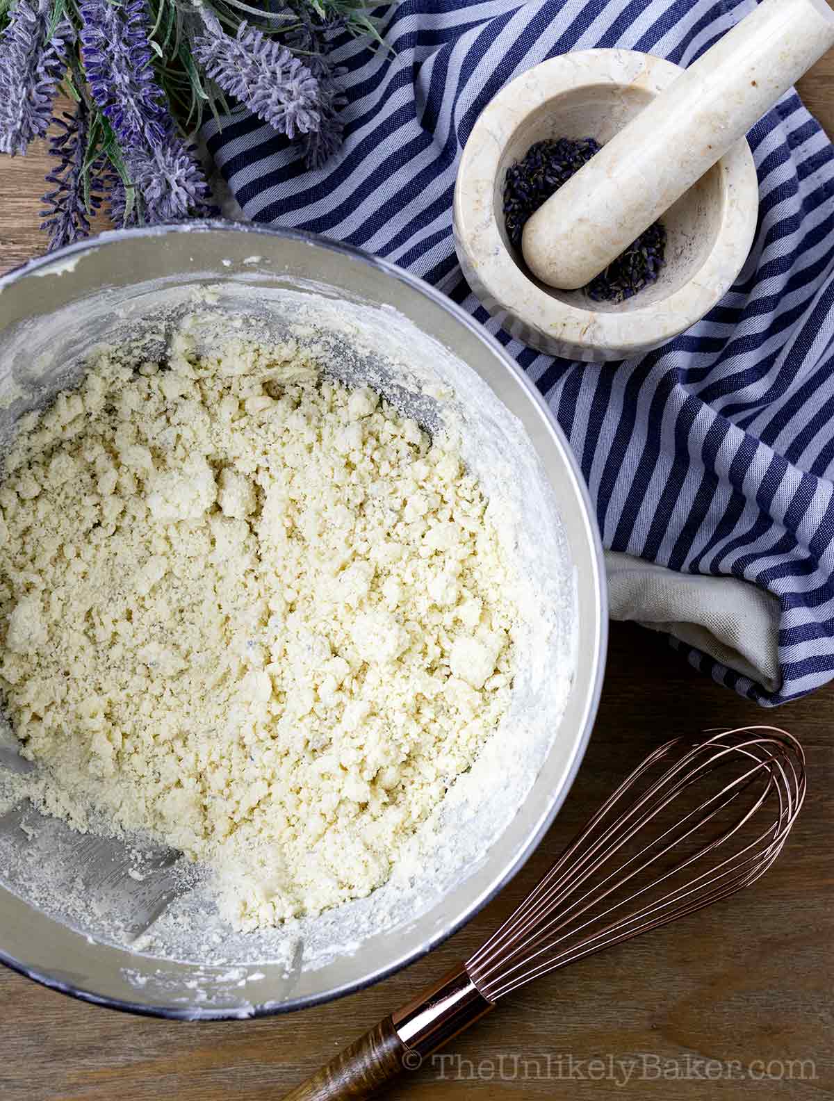 Lavender shortbread cookie dough in a bowl.