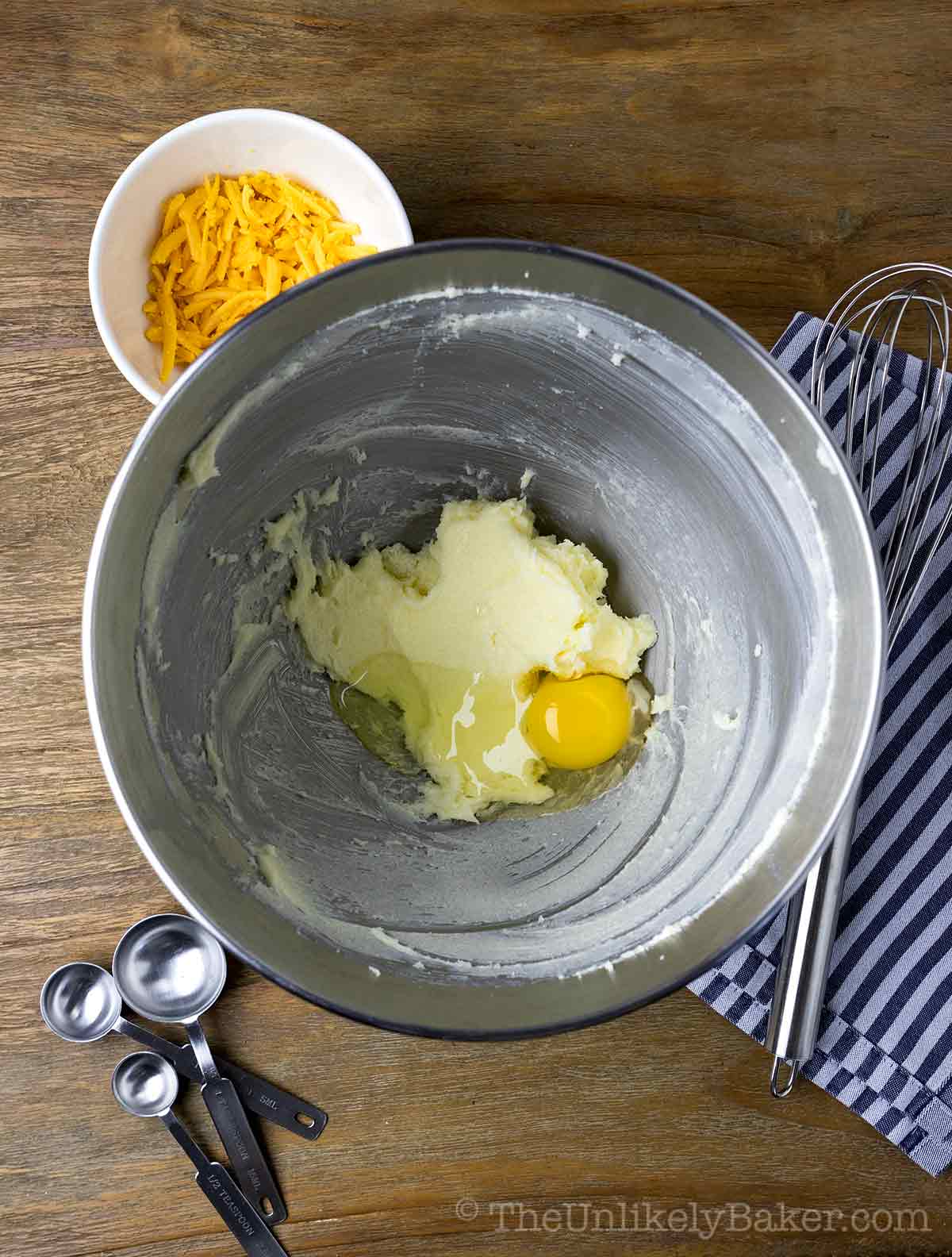 Butter and eggs in a bowl.