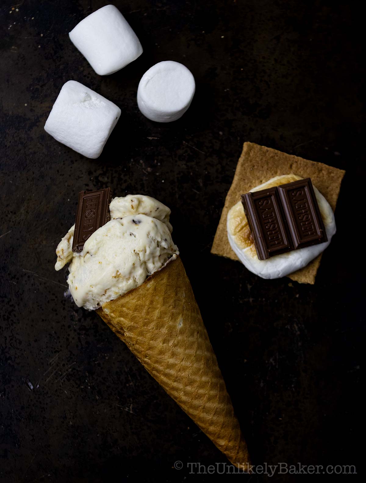 Toasted marshmallow ice cream on a cone.