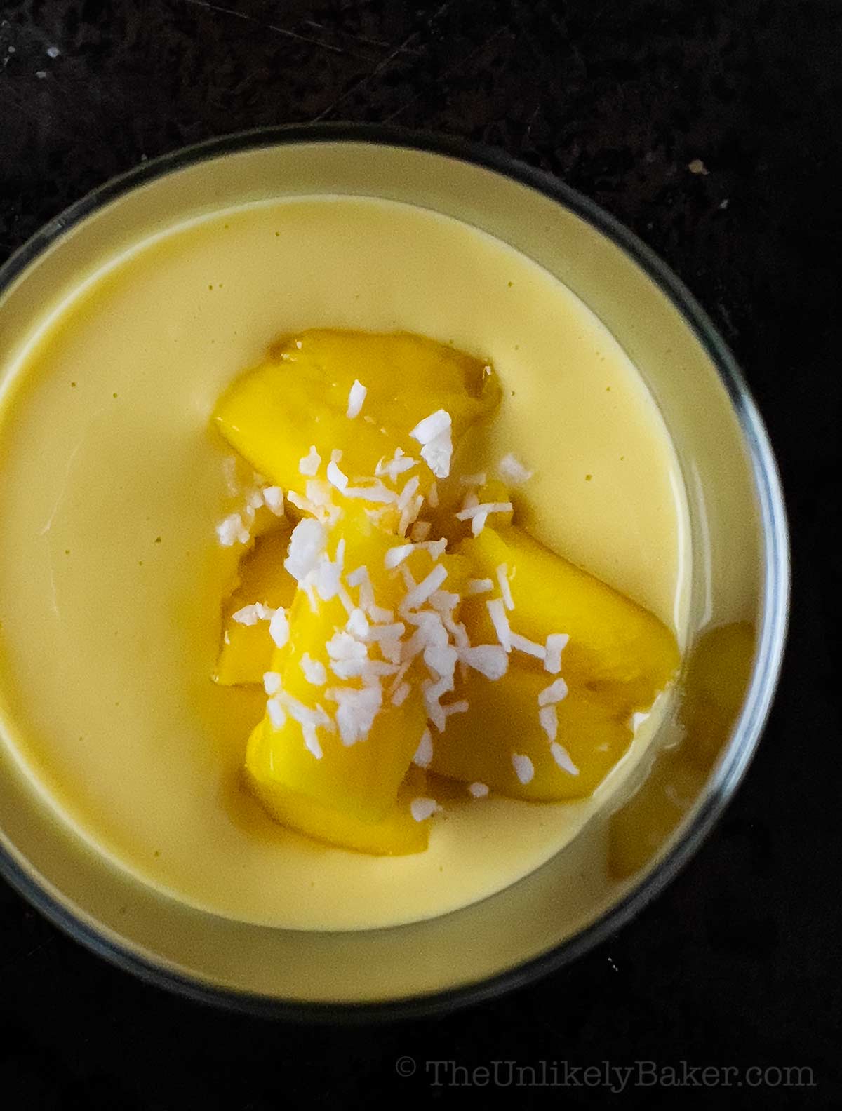 Mango chunks on mango pudding.