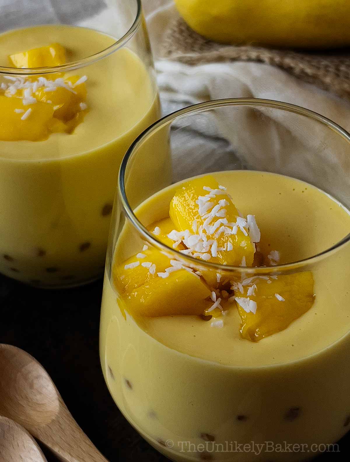 https://theunlikelybaker.com/wp-content/uploads/2023/06/2-Mango-Sago-with-Mango-Chunks.jpg