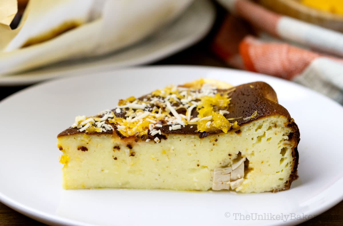 Cheesecake bibingka slice on a plate.