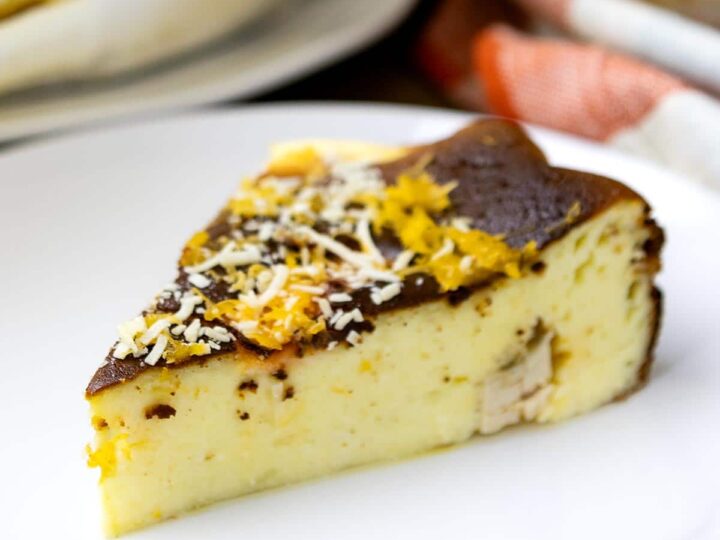 A slice of bibingka cheesecake on a plate.