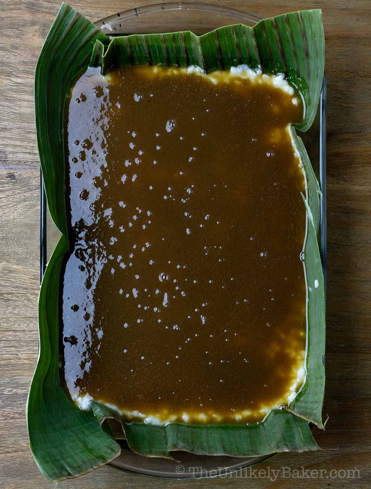Caramel coconut topping on top of cooked rice.