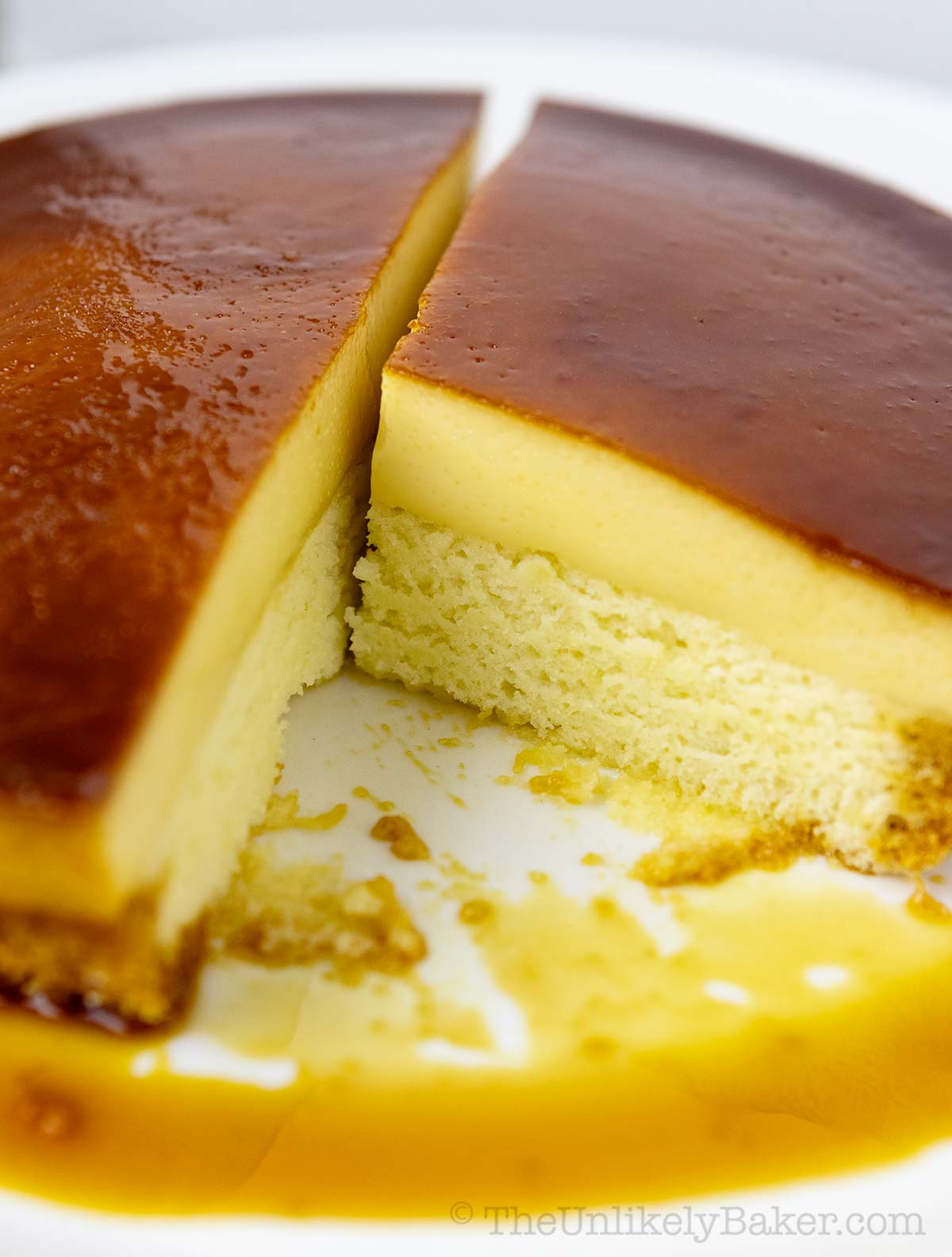 Leche flan cake showing layers of cake and flan.